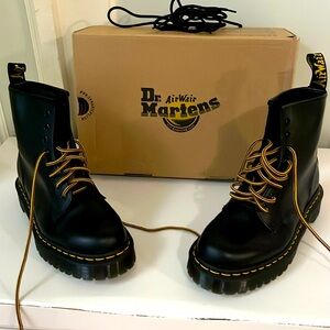 Women’s US size 8 black Doc Marten boots, never worn, with two sets of laces